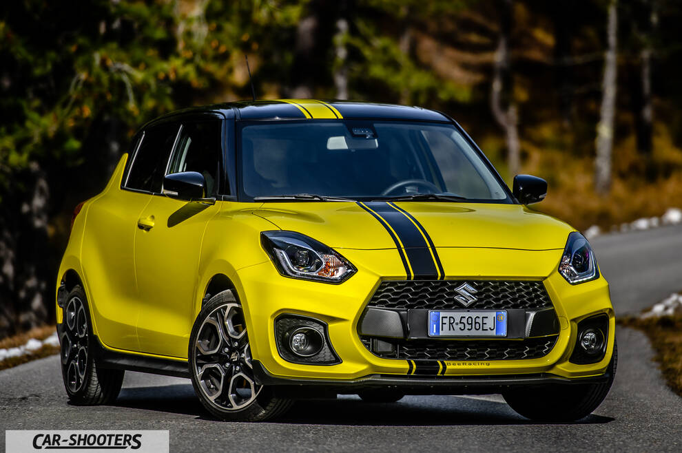 Suzuki Swift Sport – front three-quarter, yellow on a winding road