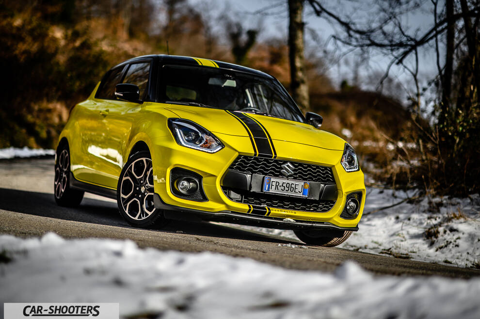 Suzuki Swift Sport – front three-quarter, yellow on a snowy country road