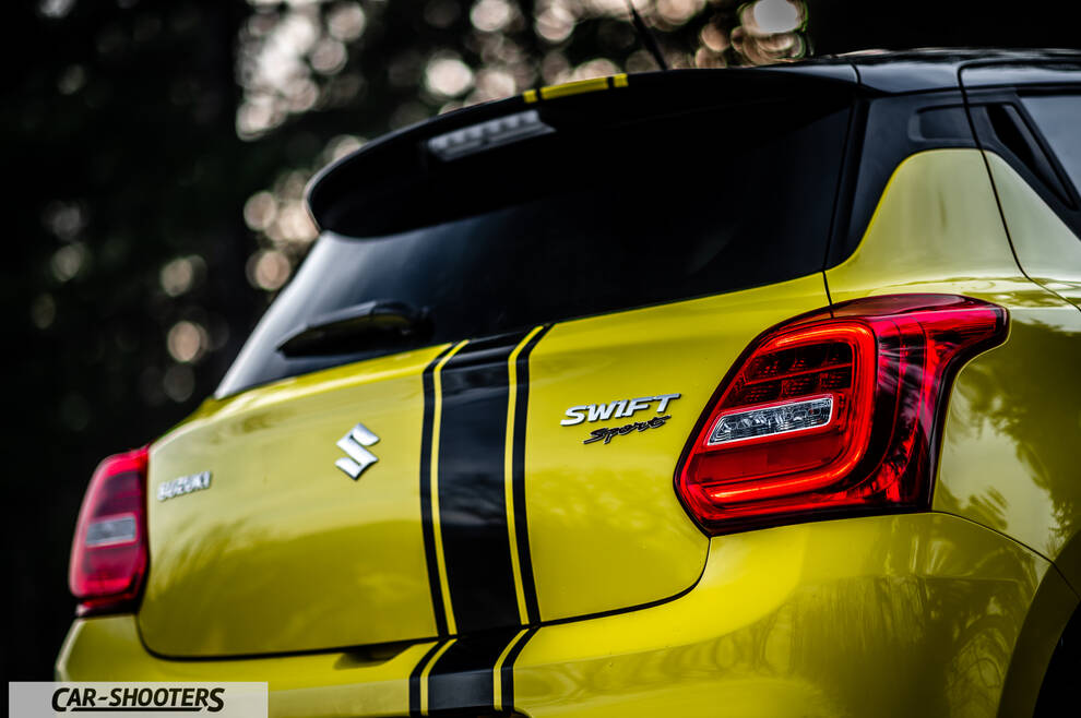 Suzuki Swift Sport – rear three-quarter, yellow with black racing stripes