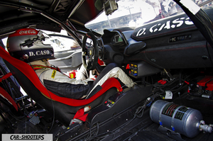 dario caso nella propria auto nella griglia di partenza del ferrari challenge trofeo pirelli all'autodromo del mugello