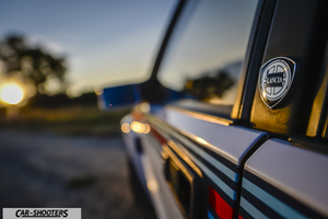 Lancia Delta HF Integrale Martini 5 – detail, emblem close-up at sunset