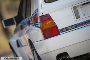 Lancia Delta HF Integrale Martini 5 – rear three-quarter, white with rally livery stripes