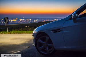 tramonto dal monte serra con dettaglio frontale mercedes slk