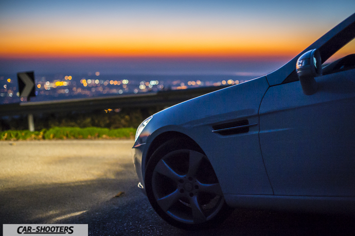 tramonto dal monte serra con dettaglio frontale mercedes slk