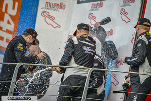 detail, people celebrating on a podium
