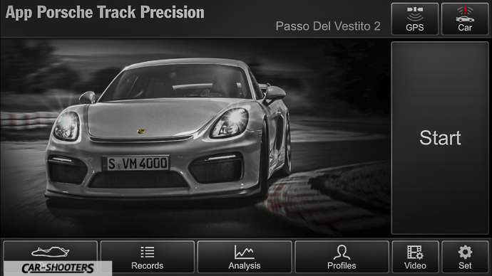 Porsche – front three-quarter, silver on a race track