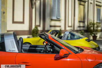 Porsche 911 Targa Storica – side profile, red parked outdoors