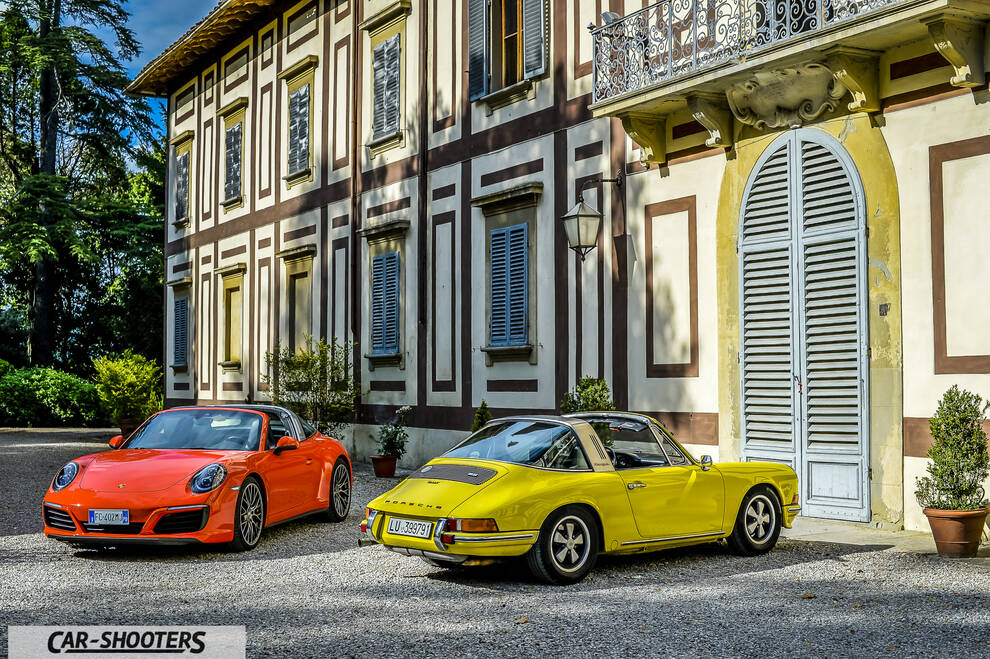 Porsche 911 Targa Storica – front three-quarter, orange in front of a historic building