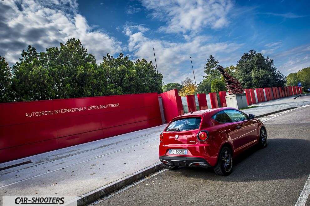 Alfa Romeo Mito Veloce Imola Mugello – rear three-quarter, red parked near a track wall