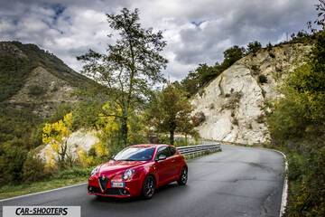 Alfa Romeo Mito Veloce Imola Mugello – front three-quarter, red on a country road