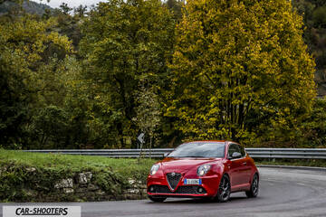 Alfa Romeo Mito Veloce Imola Mugello – front three-quarter, red on a country road