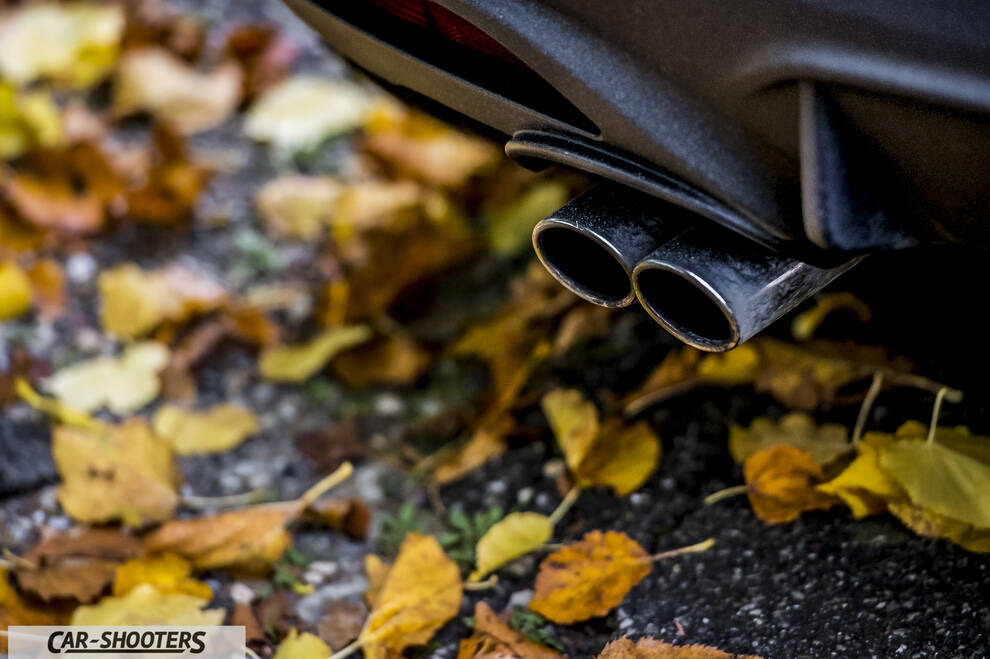 Alfa Romeo Mito Veloce Imola Mugello – detail, exhaust tip close-up over autumn leaves