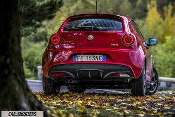 Alfa Romeo Mito Veloce Imola Mugello – rear view, red on a road with autumn leaves
