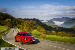 Alfa Romeo Mito Veloce Imola Mugello – front three-quarter, red on a country road