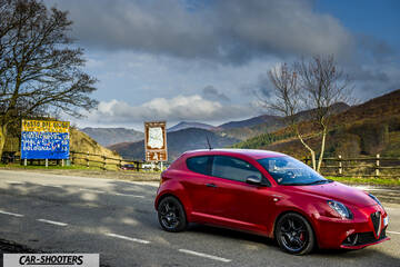 Alfa Romeo Mito Veloce Imola Mugello – front three-quarter, red on a mountain road