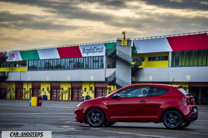 Alfa Romeo Mito Veloce Imola Mugello – side profile, red at a race track