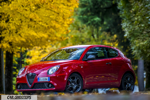 Alfa Romeo Mito Veloce Imola Mugello – front three-quarter, red against autumn foliage