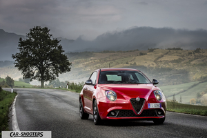 Alfa Romeo Mito Veloce Imola Mugello – front three-quarter, red on a country road