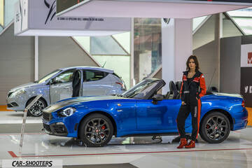 front three-quarter, blue at an auto show