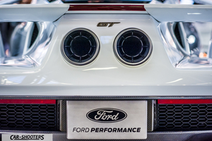 rear view, white with dual center exhaust pipes