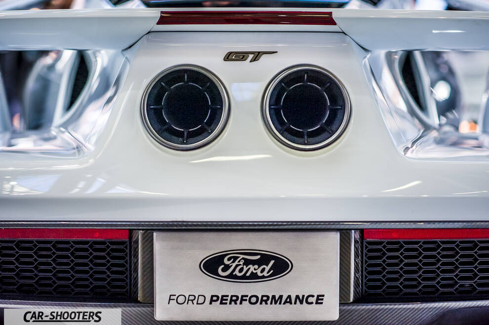 rear view, white with dual center exhaust pipes