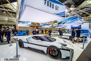 front three-quarter, white at a car exhibition