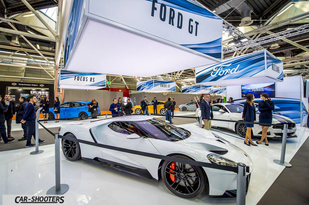 front three-quarter, white at a car exhibition
