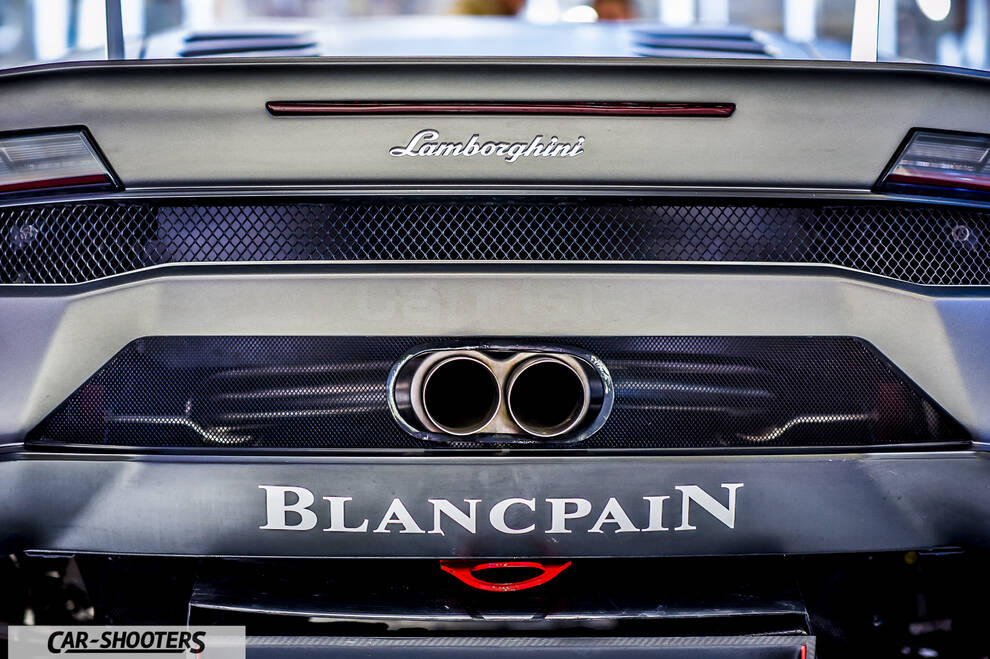 rear view, grey with dual exhaust tips