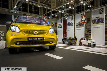 front three-quarter, yellow at a car exhibition