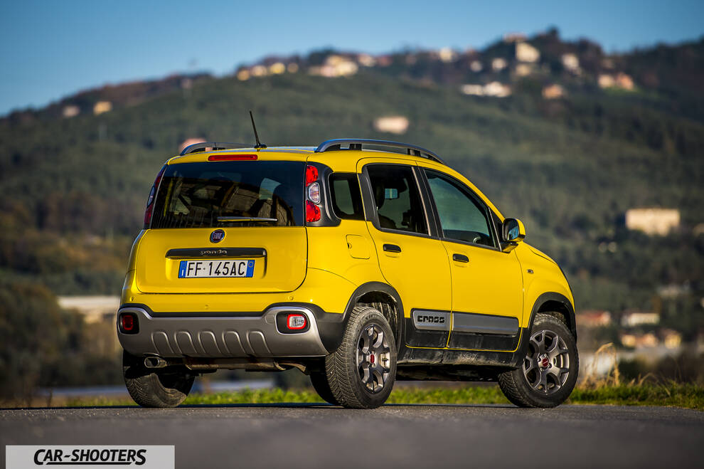 Fiat Panda 4X4 Cross – rear three-quarter, yellow against a mountain backdrop