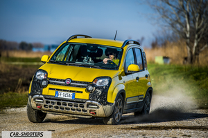 Fiat Panda 4X4 Cross – front three-quarter, yellow on a dirt road