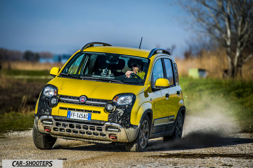 Fiat Panda 4X4 Cross – front three-quarter, yellow on a dirt road