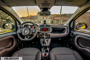 Fiat Panda 4X4 Cross – dashboard, with a village view through the windshield