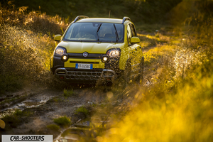 Fiat Panda 4X4 Cross – front three-quarter, yellow driving through muddy water