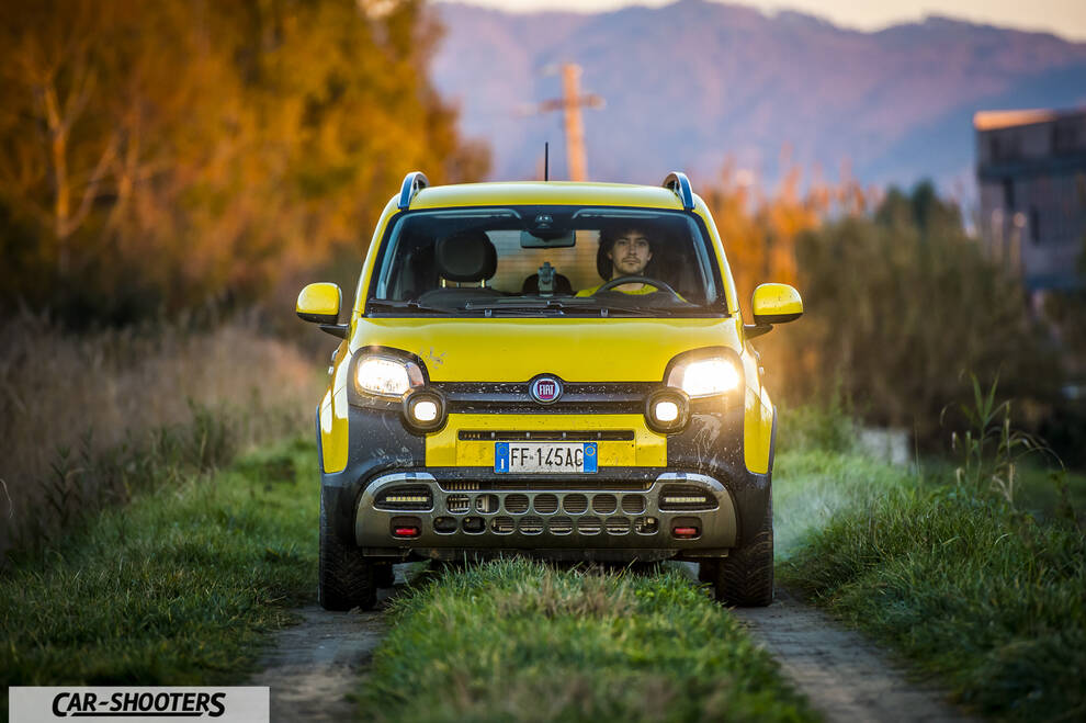 Fiat Panda 4X4 Cross – front three-quarter, yellow on a country road