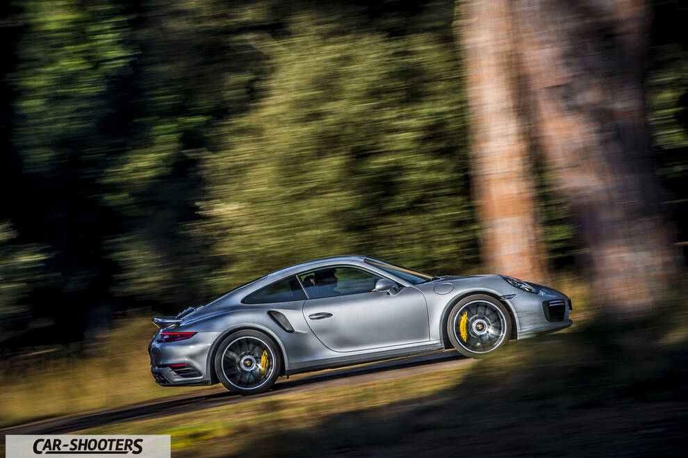 Porsche 911 Turbo S – side profile, silver on a country road