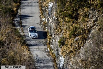 Alfa Romeo Giulietta Veloce – front three-quarter, silver on a narrow mountain road