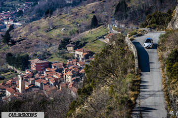 Alfa Romeo Giulietta Veloce – front three-quarter, white on a winding mountain road