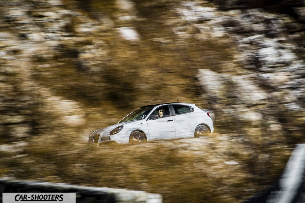 Alfa Romeo Giulietta Veloce – side profile, white on a mountain road