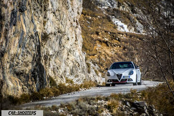 Alfa Romeo Giulietta Veloce – front three-quarter, white against a mountain backdrop