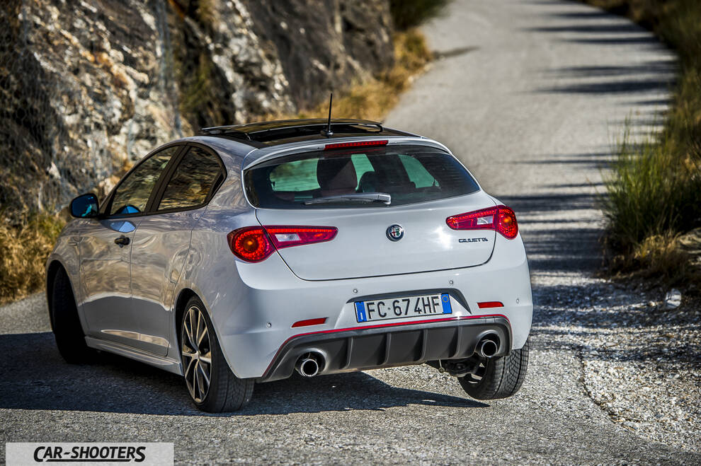 Alfa Romeo Giulietta Veloce – rear three-quarter, silver on a winding road