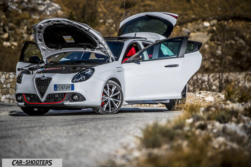 Alfa Romeo Giulietta Veloce – front three-quarter, white on a winding road