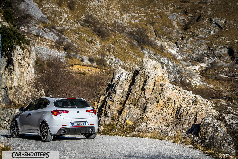 Alfa Romeo Giulietta Veloce – rear three-quarter, white against a mountain backdrop