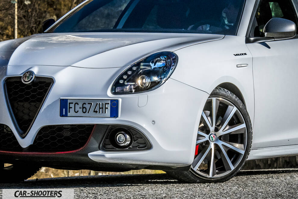 Alfa Romeo Giulietta Veloce – front three-quarter, white on a gravel surface