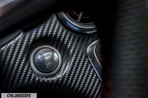 Mercedes Benz Classe A Next – detail, carbon fiber start button close-up