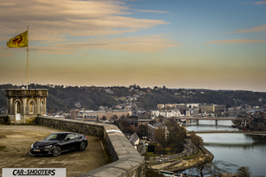 Toyota GT86 Namur – front three-quarter, black against a city skyline backdrop