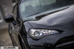 Toyota GT86 Namur – front three-quarter, black against a blurred background