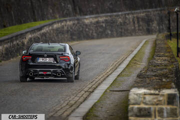 Toyota GT86 Namur – rear view, black on a country road