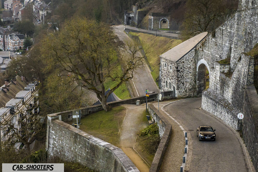 Toyota GT86 Namur – front three-quarter, brown on a winding hillside road