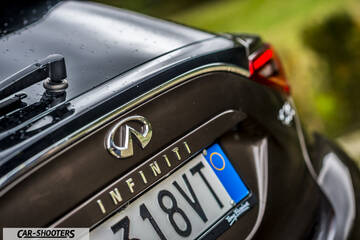 Infiniti Q30 – rear view, brown metallic with rear badge